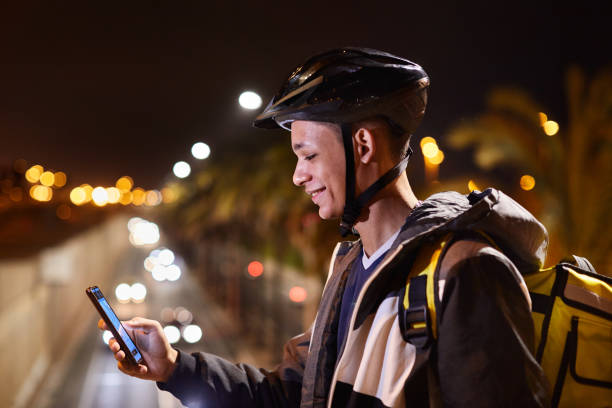 istock A young delivery person looking at a map in a GPS app 1318996611