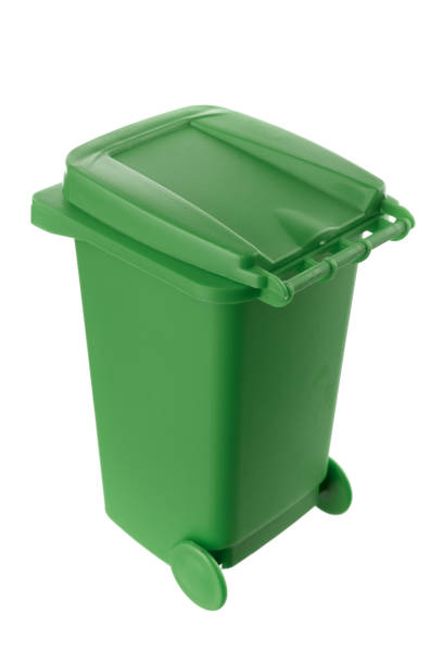 istock Plastic green trash can isolated on white background 1318999340