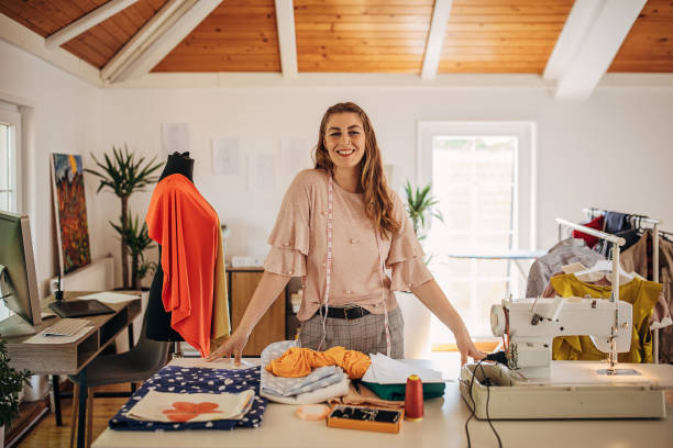 istock Female fashion designer in her workshop 1319000667