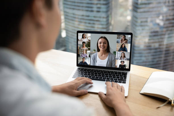istock Male worker have video webcam call with diverse colleagues 1319001126