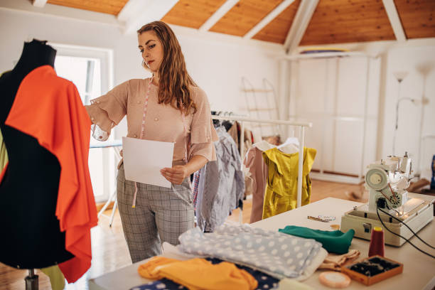 istock Female fashion designer working 1319001127