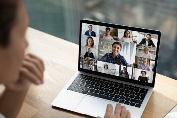 istock Multiethnic employees talk on video zoom call 1319001128