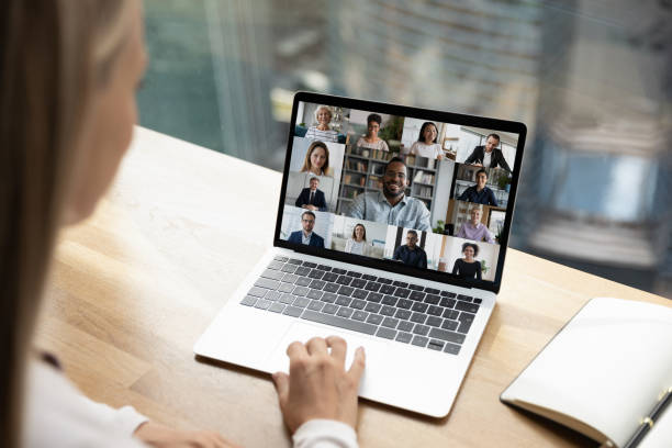 istock Multiracial employees talk on webcam zoom conference 1319001136
