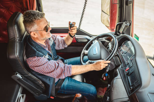 istock Mature truck driver CB talking 1319002430