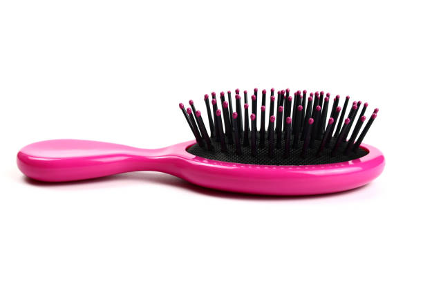 istock Plastic massage hair brush isolated on white background 1319003553