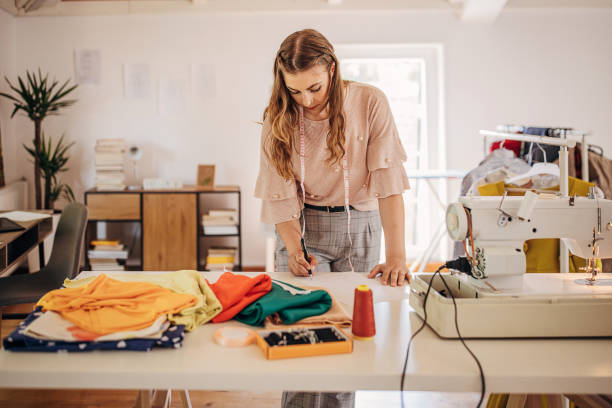 istock Female fashion designer working 1319005010