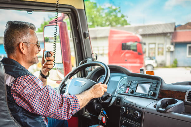 istock Mature truck driver CB talking 1319006399