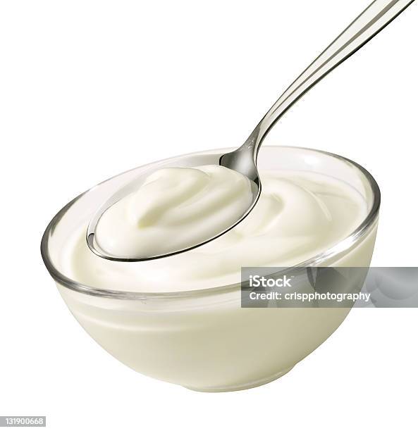 Foto de Tigela Com Iogurte e mais fotos de stock de Iogurte - Iogurte, Colher - Faqueiro, Branco