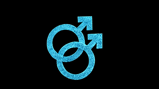 Blue colour interlocking male gender symbols created from dust on the black background.