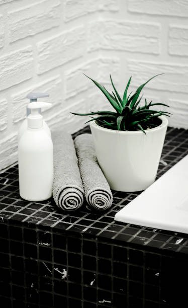 istock Towels with Liquid Soap on Table in Bathroom. 1319010758