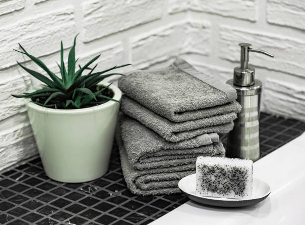 istock Towels with Liquid Soap on Table in Bathroom. 1319010762