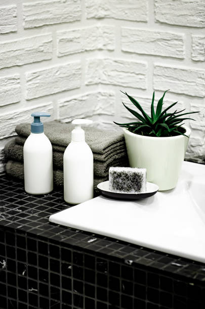 istock Towels with Liquid Soap on Table in Bathroom. 1319010763