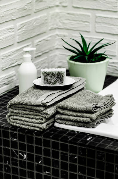 istock Towels with Liquid Soap on Table in Bathroom. 1319010774