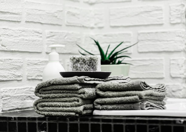 istock Towels with Liquid Soap on Table in Bathroom. 1319010777