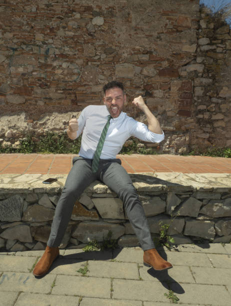 istock man with a victory attitude, sitting and looking at the camera 1319011782