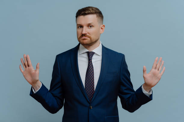 istock Confident businessman saying strict NO while rejecting offer 1319015331