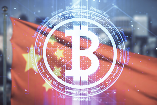 Virtual Bitcoin hologram on flag of China and blurry cityscape background. Multiexposure