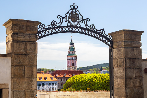 Cesky Krumlov, Czech republic - 05 11 2021: Iron gate and tower of Cesky Krumlov Castle