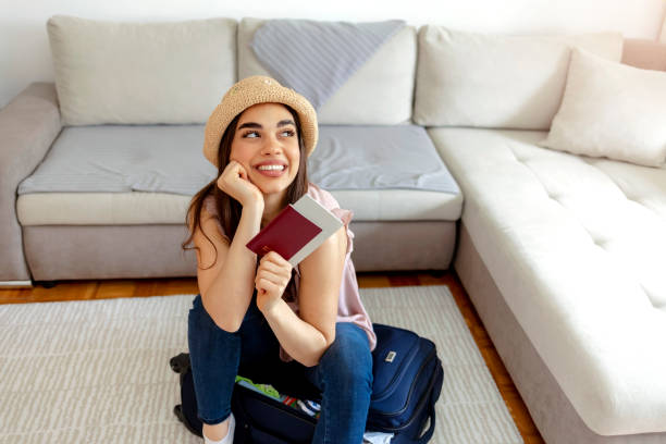 istock The young woman is excited for her first vacation after a long time, due to a global problem caused by the Coronavirus. 1319016706