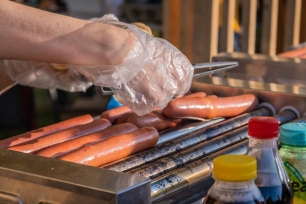 istock Sausages are fried on a rotary cooking machine 1319020559