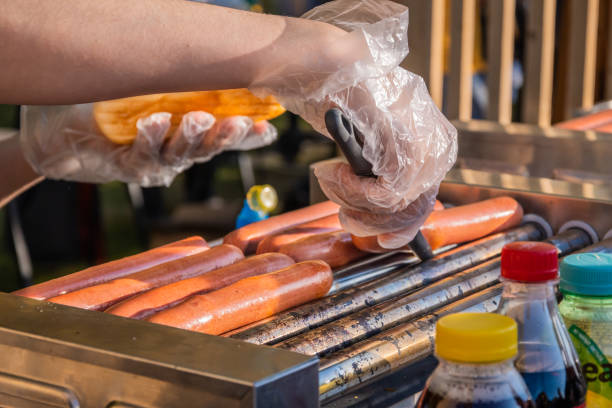 istock Sausages are fried on a rotary cooking machine 1319020661