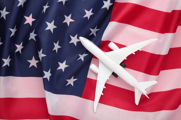istock Toy plane with american flag. Travel concept 1319020690