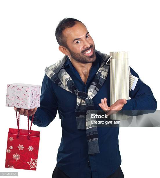 Bearded Man Holding A Variety Of Wrapped Gifts Stock Photo - Download Image Now - Holding, Shopping Bag, Adult