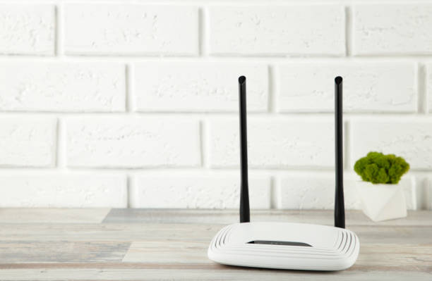 istock Wireless Wi-Fi router on a white background with copy space 1319021719
