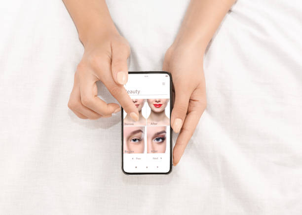 istock Augmented Reality Beauty App. Woman Trying Different Makeup Online 1319023051