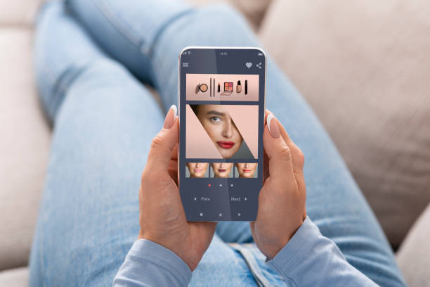 istock Augmented Reality Beauty App. Woman Trying Different Lipstick Color Online 1319023471