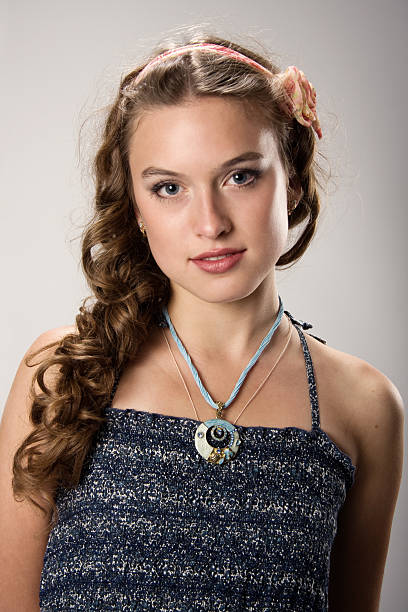 Portrait of a pretty young girl with long ringlets hair stock photo