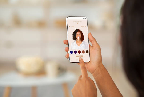 augmented reality beauty app. woman trying different hair color online - hair net imagens e fotografias de stock