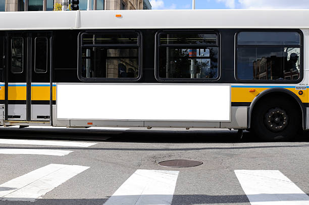 Billboard on Bus Side Billboard on bus side. Outdoor advertisement in the city. commercial sign stock pictures, royalty-free photos & images