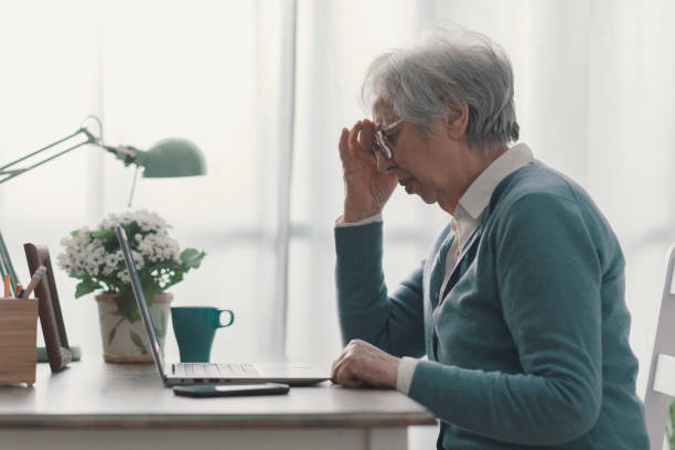 istock Senior woman having a bad headache 1319027422