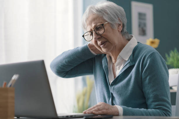 istock Senior woman having neck pain 1319027476