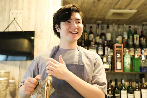 istock Young Asian man working at cafe and bar 1319027688