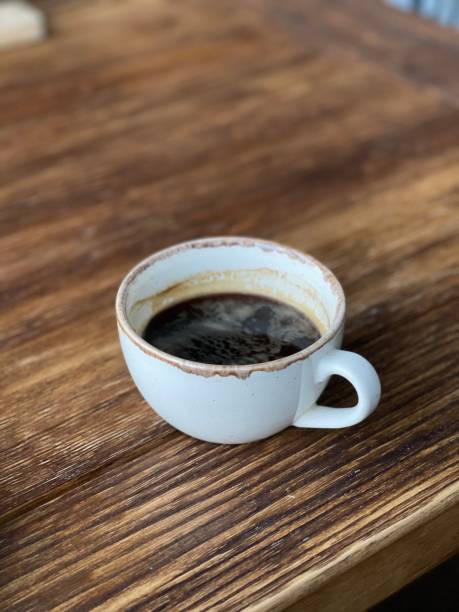 istock cup of coffee on wooden table 1319027789