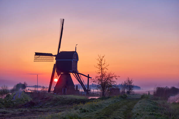 istock Windmill The Broekmolen during sunrise 1319028053