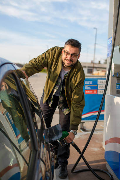 istock A man is refueling at a gas station 1319029460