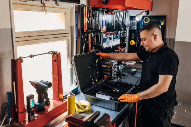 istock Male mechanic in his workshop 1319030524