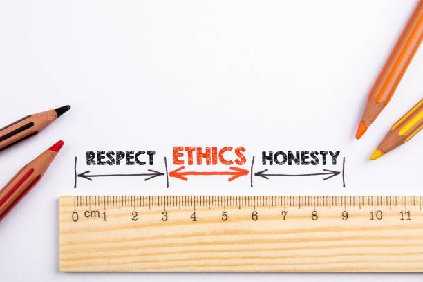 istock Ethics, Respect and Honesty concept. Wooden liner with colored pencils on a white background 1319030830