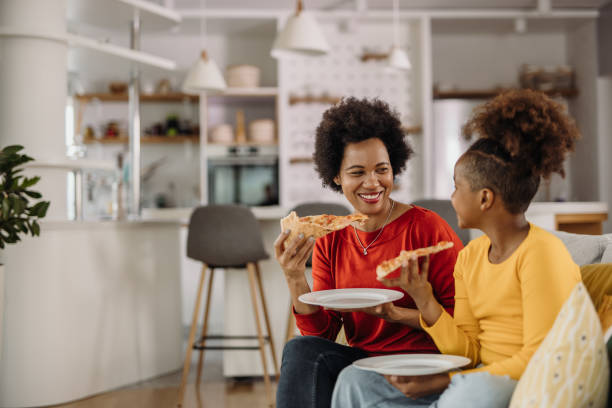 istock Looking at each other, pizza tasty delicious. 1319032696