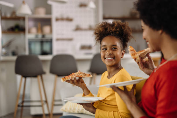 istock Mixed race people, having dinner at home. 1319032698