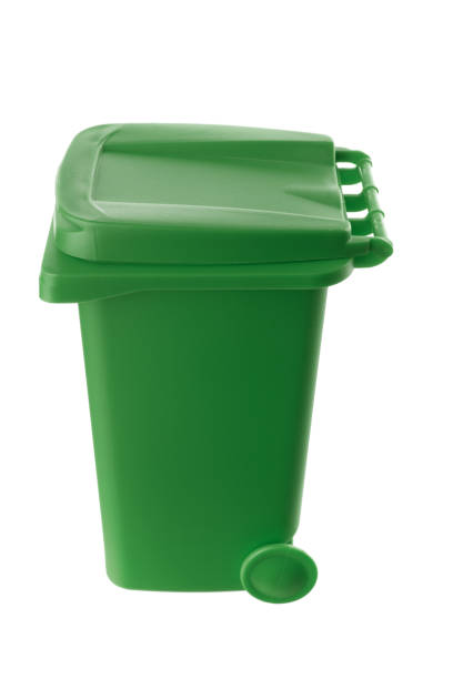 istock Plastic green trash can isolated on white background 1319034171