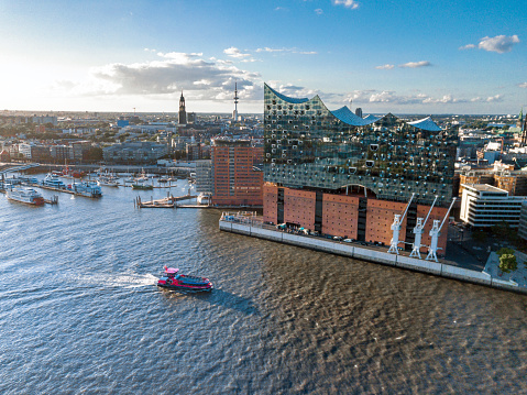 Wide panoramic drone view over the river at Hamburg Hafen city