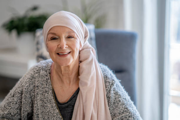 istock Smiling senior with cancer 1319049968