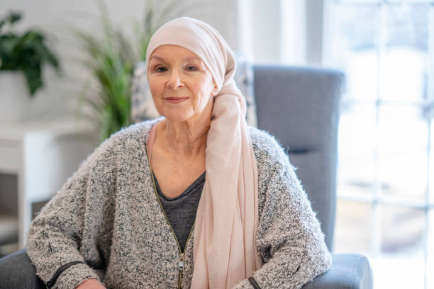 istock Smiling senior with cancer 1319049979
