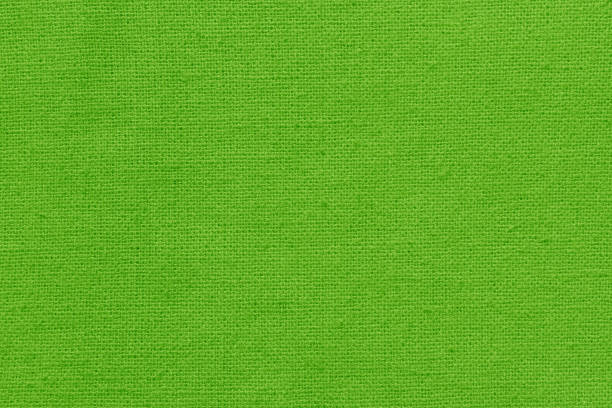 Light green cotton fabric texture background, seamless pattern of natural textile.