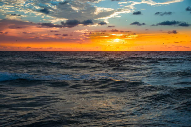 istock Bright colorful orange sunrise 1319052867