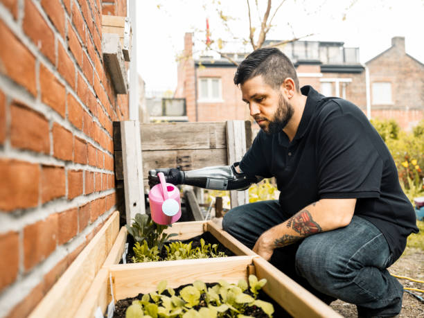 istock Amputee urban gardener 1319056979